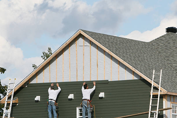 Professional Vinyl Siding technician working in Bailey, NC
